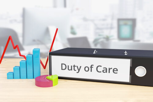 Duty of Care – Finance/Economy. Folder on desk with label beside diagrams. Business/statistics. 3d rendering
