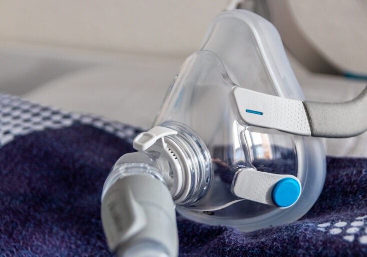 CPAP mask against obstructive sleep apnea on pillow helps patien